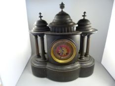 A Black Slate mantle clock with pillared decoration - A/F