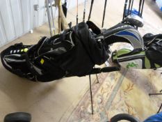 A Canaveral Golf bag containing Dunlop irons, 4-9, sand wedge, pitching wedge, rescue club, Five