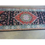 A Long Red Ground Runner with all over design 630cm x 90cm