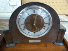 Two wooden mantle clocks