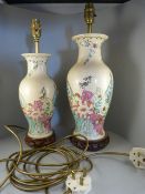 A Pair of oriental vases converted into lamps, decorated with leaves