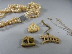 A Worked Ivory Monkey, Elephant and one other, Silver 925 pendant and pearls