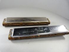 Two Hohner harmonicas