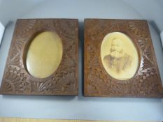 A Pair of carved oak photo frames