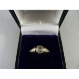An 18ct Gold Diamond Solitaire set in Platinum