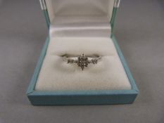 A 9ct White Gold Diamond cluster ring Size N 60