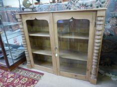 An antique pine dresser top. glass missing on one door