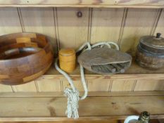 A turned oak tea caddy, cow bell, turned wooden bowl and a Treen pot