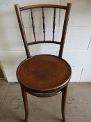 A small bentwood bedroom chair