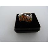 A Silver Ring Wave Design band approx 10.5mm wide set with Synthetic Black Opal Size - R(UK) 8-5/
