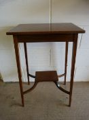 An Edwardian inlaid side table