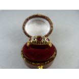 An 18ct Gold Victorian style ring set with 3 Rubies and 2 bright old cut Diamonds approx 3.2mm