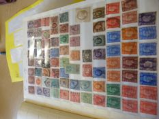 A Stamp album containing various stamps - to include a penny red star, Seahorse