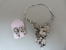 A Boxed costume Jewellery Tiger Necklace with matching earrings