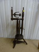 A Turned wood antique spinning wheel.
