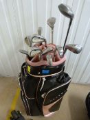 A GreenNV Golf bag containing set of La Jolla Irons, 4 - 9, plus sand wedge, spalding putter and