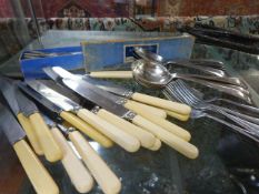 A quantity of silverplated cutlery