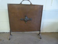 An Arts and Crafts copper fire screen