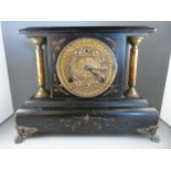 A wooden Mantle Clock by WM Gilbert USA (pendulum and key in office