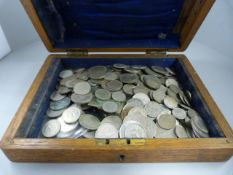 A large quantity of Early English silver coins to include Shillings and Sixpences etc in an Oak Box