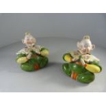 A pair of oriental style seated nodding figures - 1 A/F