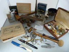 A Tray containing small amount of silver, Metal figure if a canon, Gavel, Seal, pens and a 9ct