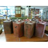 Seven vintage petrol cans (7)