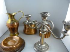 A quantity of silverplate and brassware to include jelly moulds etc over two shelves