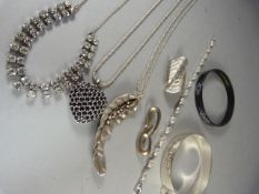 A quantity of costume jewellery to include marked silver