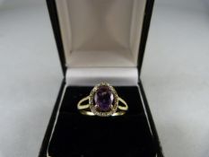 A 9ct Gold Diamond and Amethyst Ring - Size Q