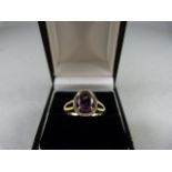 A 9ct Gold Diamond and Amethyst Ring - Size Q