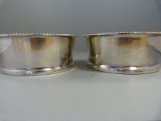 A Pair of Hallmarked silver Winecoasters with crystal glass bottoms - one stamped Mappin and Webb,