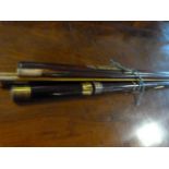 Two antique fishing rods