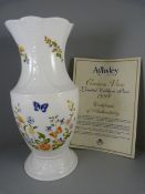 A Boxed commemorative tea set, Royal Worcester Collector plate (boxed), Aynsley Vase and two other