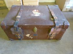 A Large steamer trunk marked GCP 'Harrods' - torn sticker to front ' Cunard White Star Line possibly