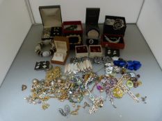 A quantity of various boxed costume jewellery