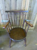 An Oak captains style chair