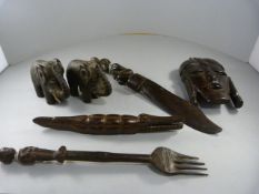 Collection of African carved items - to inlcude a letter opener, elephant figures etc