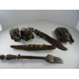 Collection of African carved items - to inlcude a letter opener, elephant figures etc