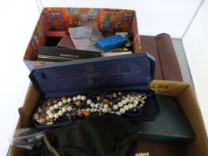 Two boxes containing vintage costume jewellery and coins etc