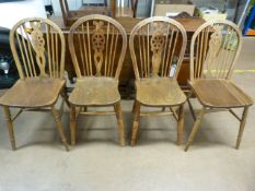A Set of four wheelback chairs