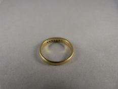 A 9ct Gold Diamond Band Ring Size K