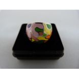 A Silver ring decorated with floral Multi-Coloured enamel measuring 18.2mm across the top Size - N(