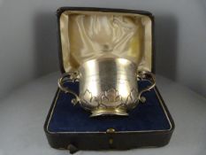 A hallmarked silver bowl in presentation case - weight