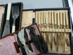 Three boxed sets of cutlery