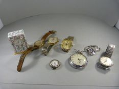 A quantity of vintage watches - to include a Halcyon Days enamelled clock, a Silverplate Ingersoll