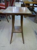 An Oak two tier occasional table