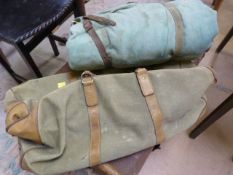 A vintage army camp bed with bag