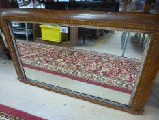 An Edwardian inlaid overmantle mirror