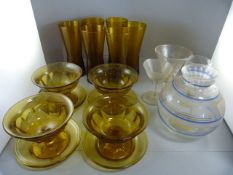 A quantity of mainly amber coloured glassware, and three other pieces